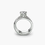 Solitaire With Double Baguette Channel Bands, front view